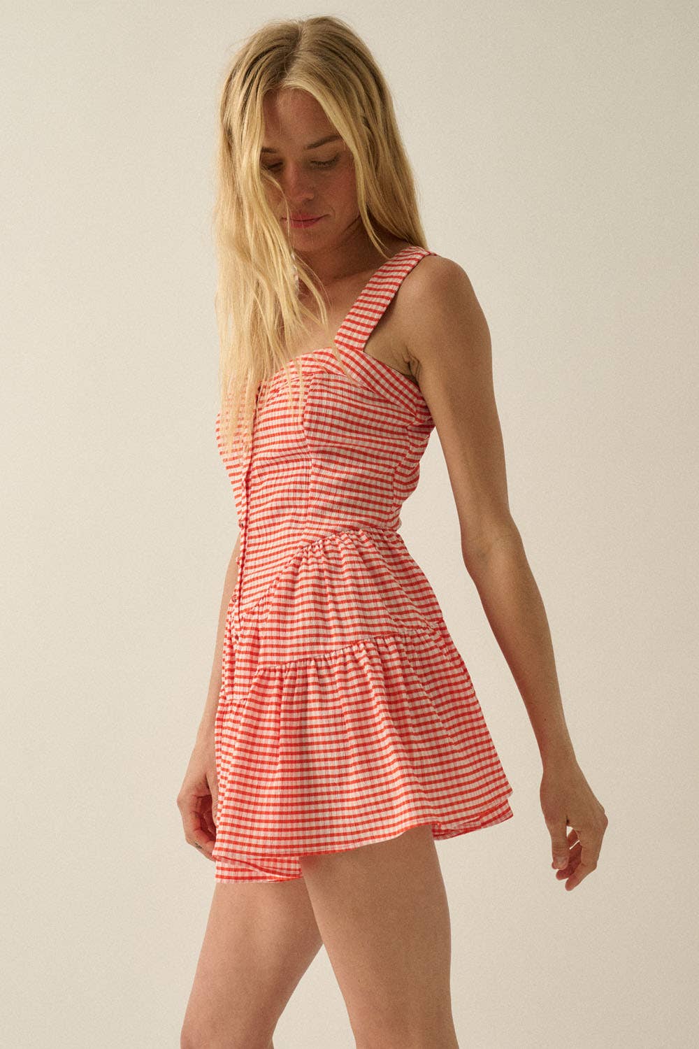 Gingham sleeveless romper with tiered ruffles from Steel & Saddle western wear