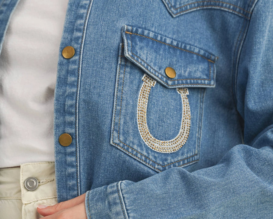 Cloud Ten rhinestone horseshoe denim jacket, close-up of the chest pocket