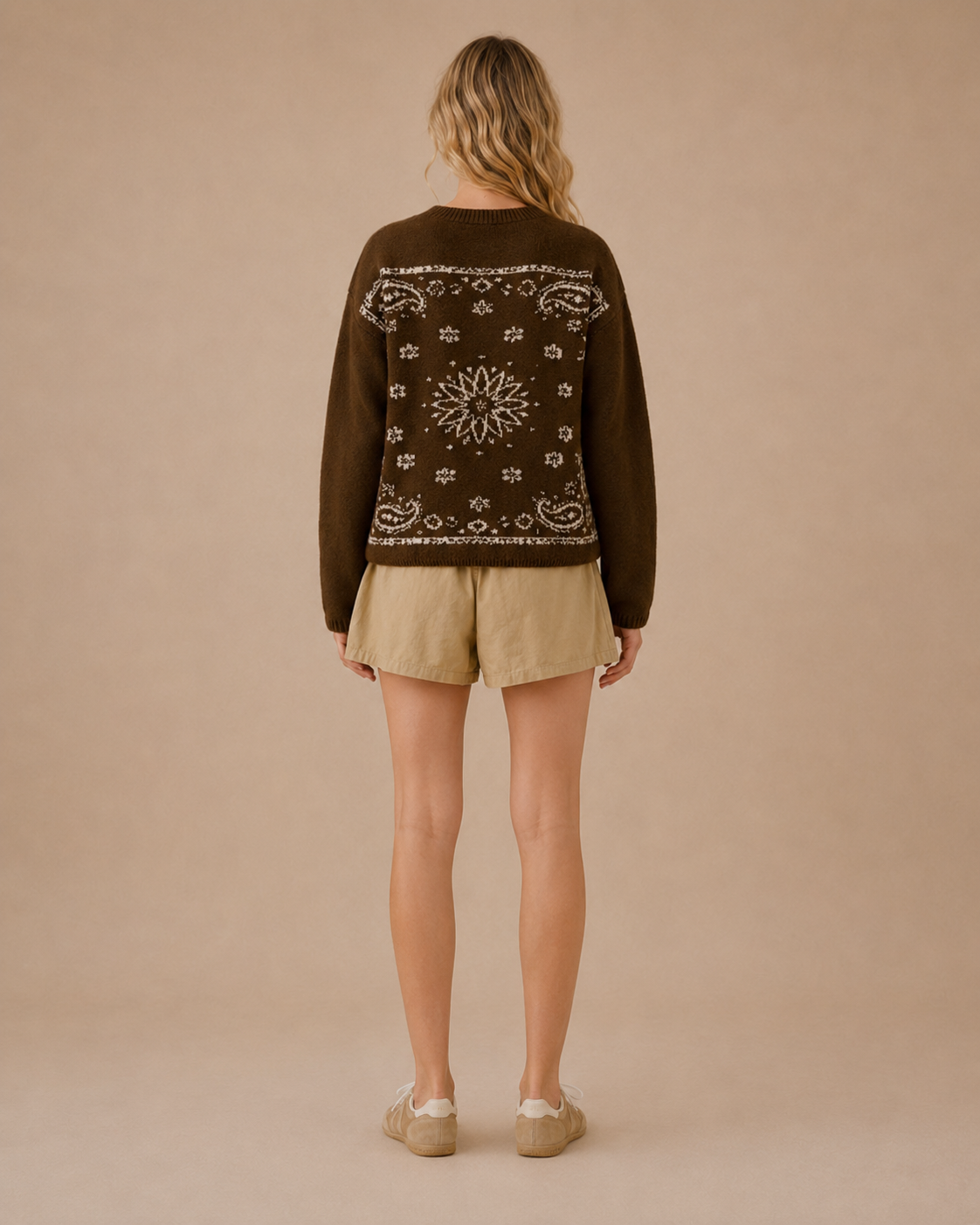 Back of the bandana crewneck sweater with the cream bandana pattern across the back