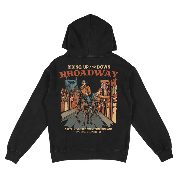Broadway Hoodie back print, cowboy riding a horse down neon lit Lower Broadway in Nashville