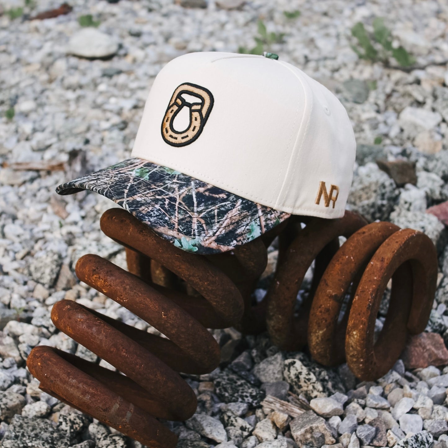 Camo western hat with Steel & Saddle branding, alternate view
