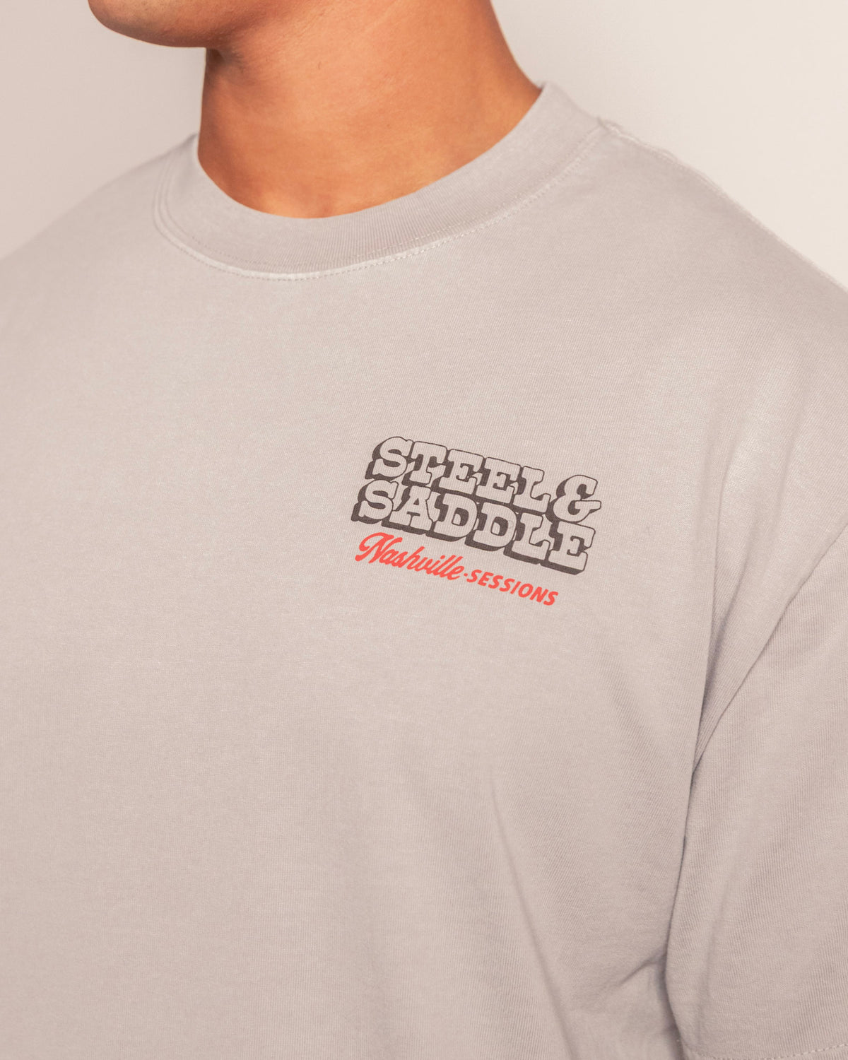 Nashville Sessions Tee in faded storm, close-up of the Nashville Sessions chest print