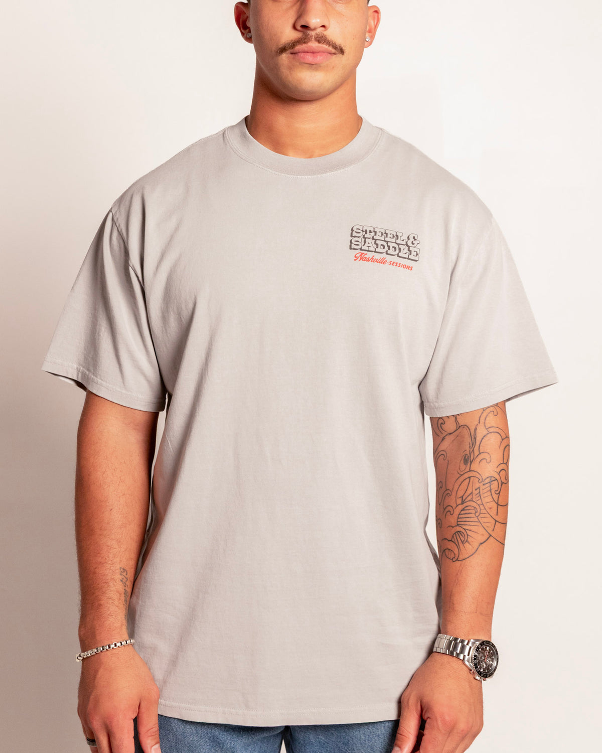 Nashville Sessions Tee in faded storm on model, front view with the Nashville Sessions chest print