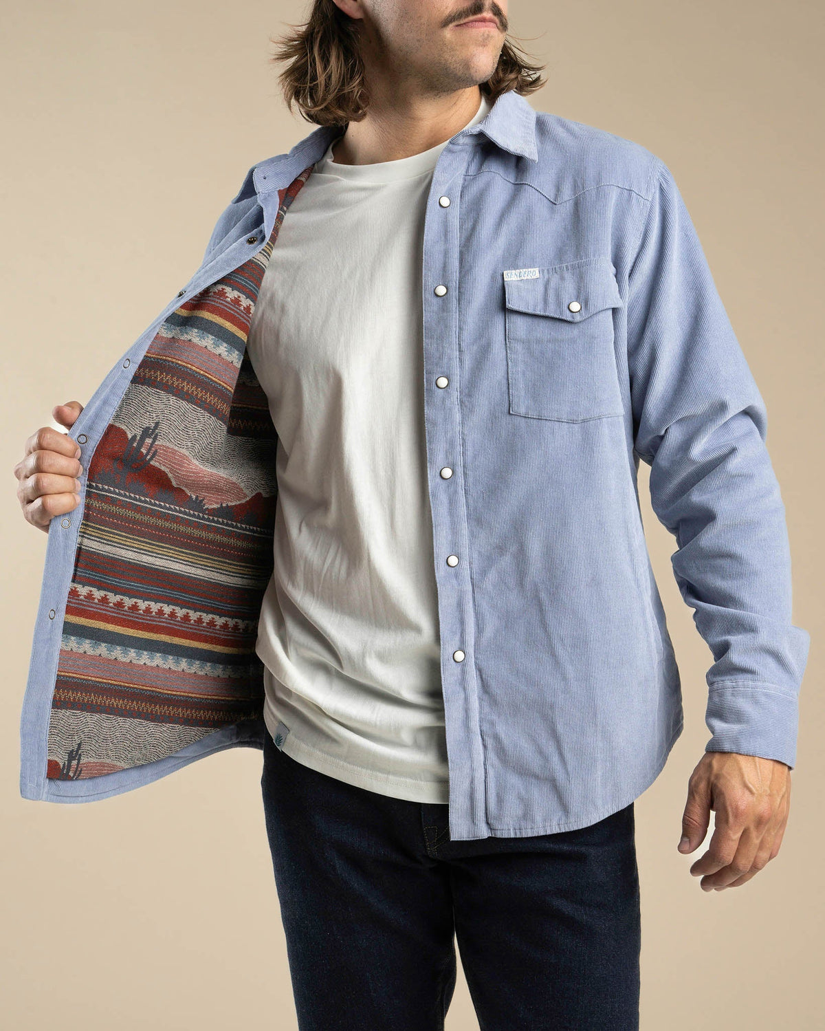 Sendero Desperado Shacket in powder blue, pearl snap and pocket detail