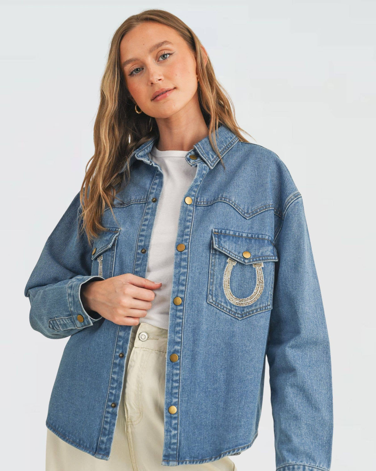 Cloud Ten rhinestone horseshoe denim shirt jacket, front on model